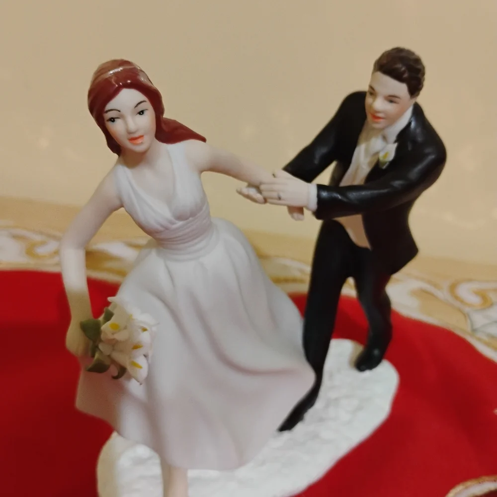 Elegant Wedding Cake Topper with Bride and Groom